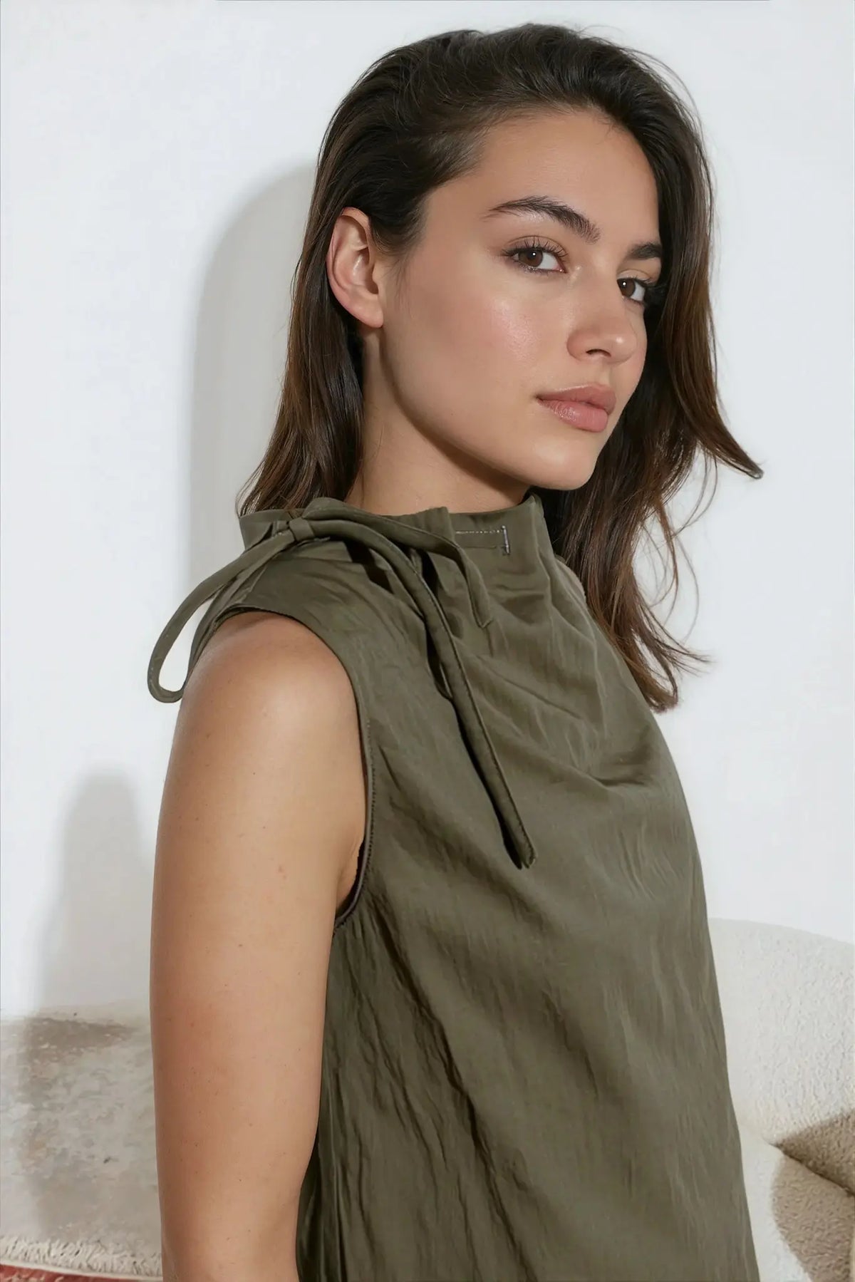 Naked Zebra Cinched Mocked Neck Sleeveless Top